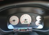Used Lancer Evo for import from Japan via Japan Car Direct. Instrument cluster with turbo timer