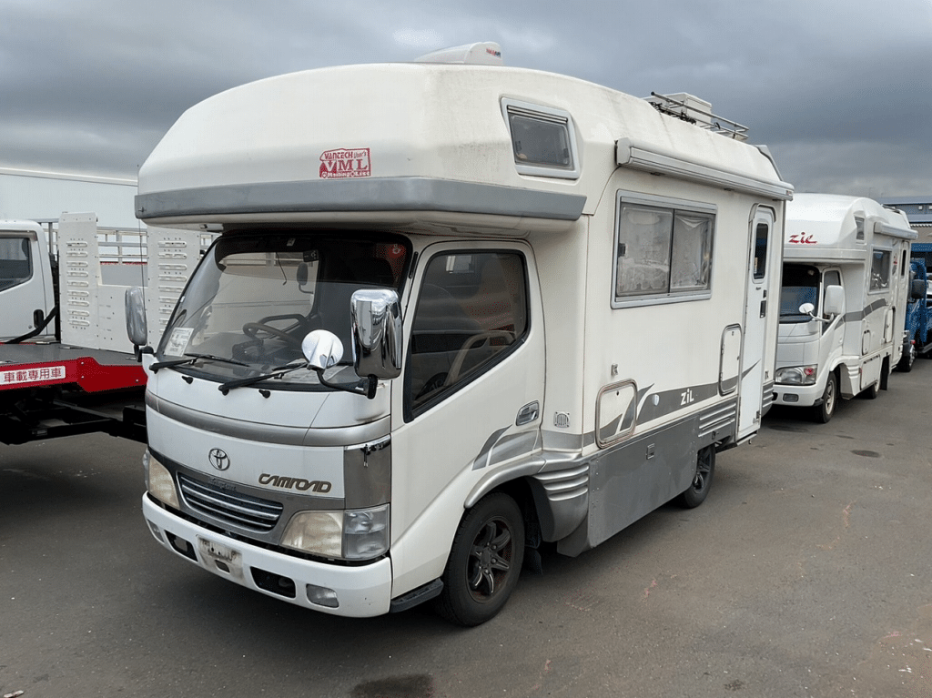 Toyota Camroad, Camper Van, RV Conversion, Camping Vehicle, Compact Motorhome, Japanese Import, Cozy Interior, Mobile Home on Wheels, Off-Grid Living, Travel Adventure, Japan Car Direct