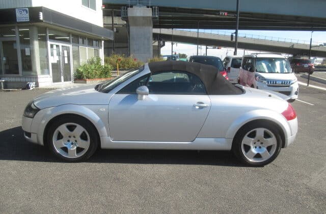 side view with top up. Buy and self import from Japan of clean Audi TT to Jebel Ali