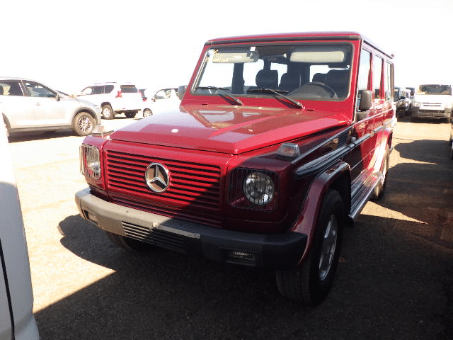 Red Mercedes-Benz G320, Premium luxury SUV, Off-road capabilities, G-Class SUV, Mercedes G320 specs, High-performance vehicle, V8 engine power, Classic red G-Wagon, Japan Car Direct