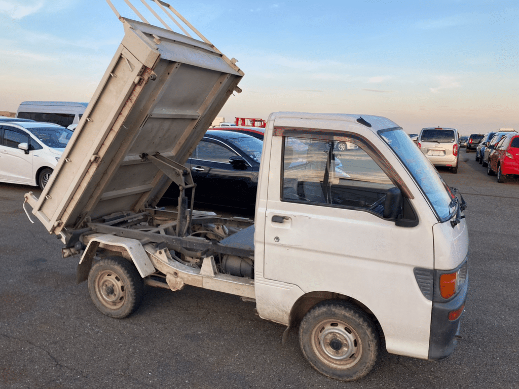 Daihatsu Hijet Dump Truck, Compact Hauler, Hijet Mini Dump, Utility Dump Vehicle, Small Dump Truck, Daihatsu Dump Features, Import Hijet Dump, Efficient Utility Vehicle, Japan Car Direct