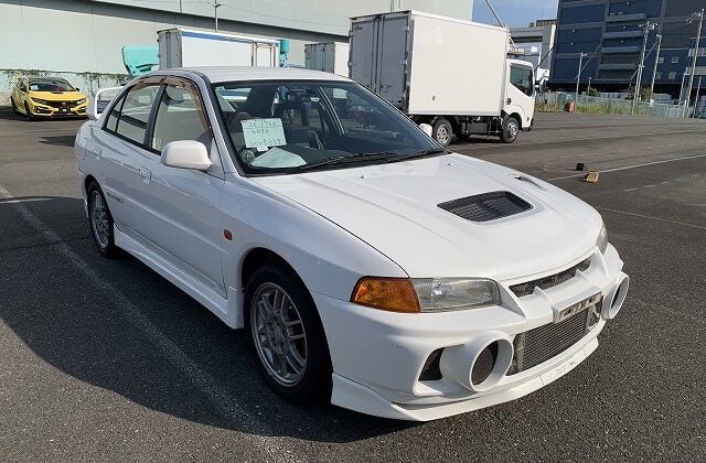 Lancer Evolution IV, Evo 4, JDM Rally Car, Turbo Sedan, Classic Evo Models, Japan Car Auctions, Rally Buyers, Performance Market, Evo Import, Japan Car Direct, CN9A