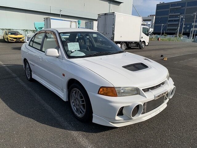 Lancer Evolution IV, Evo 4, JDM Rally Car, Turbo Sedan, Classic Evo Models, Japan Car Auctions, Rally Buyers, Performance Market, Evo Import, Japan Car Direct, CN9A