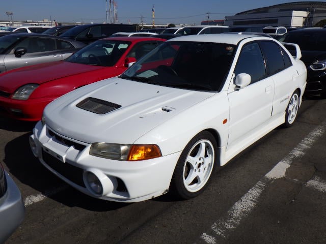 Mitsubishi Lancer Evolution IV, Used Mitsubishi Evo 4, JDM Lancer Evolution IV, Mitsubishi Evo 4 White, Mitsubishi Evo 4 Large Wing, Japan Used Car Auctions, Lancer Evo Import From Japan, Used Cars Export Japan, Export Cars From Japan, Japan Car Direct, CN9A, 4G63
